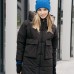 Купить дизайнерский пуховик женский длинный зимний с капюшоном и карманами черного цвета и модный