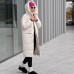 Купить дизайнерский пуховик женский длинный зимний с капюшоном и карманами светлого цвета и модный